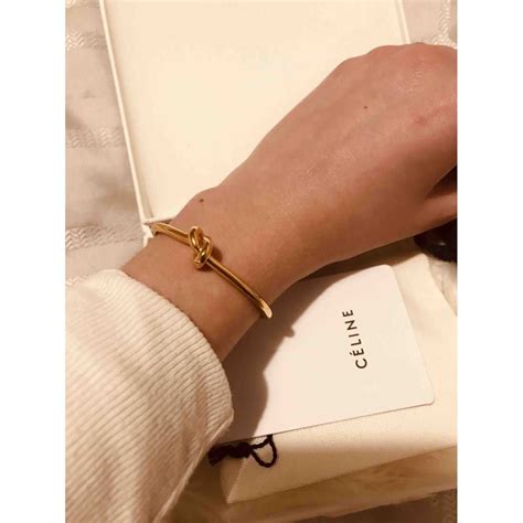 celine knot bracelet gold price|celine knot bracelet gold.